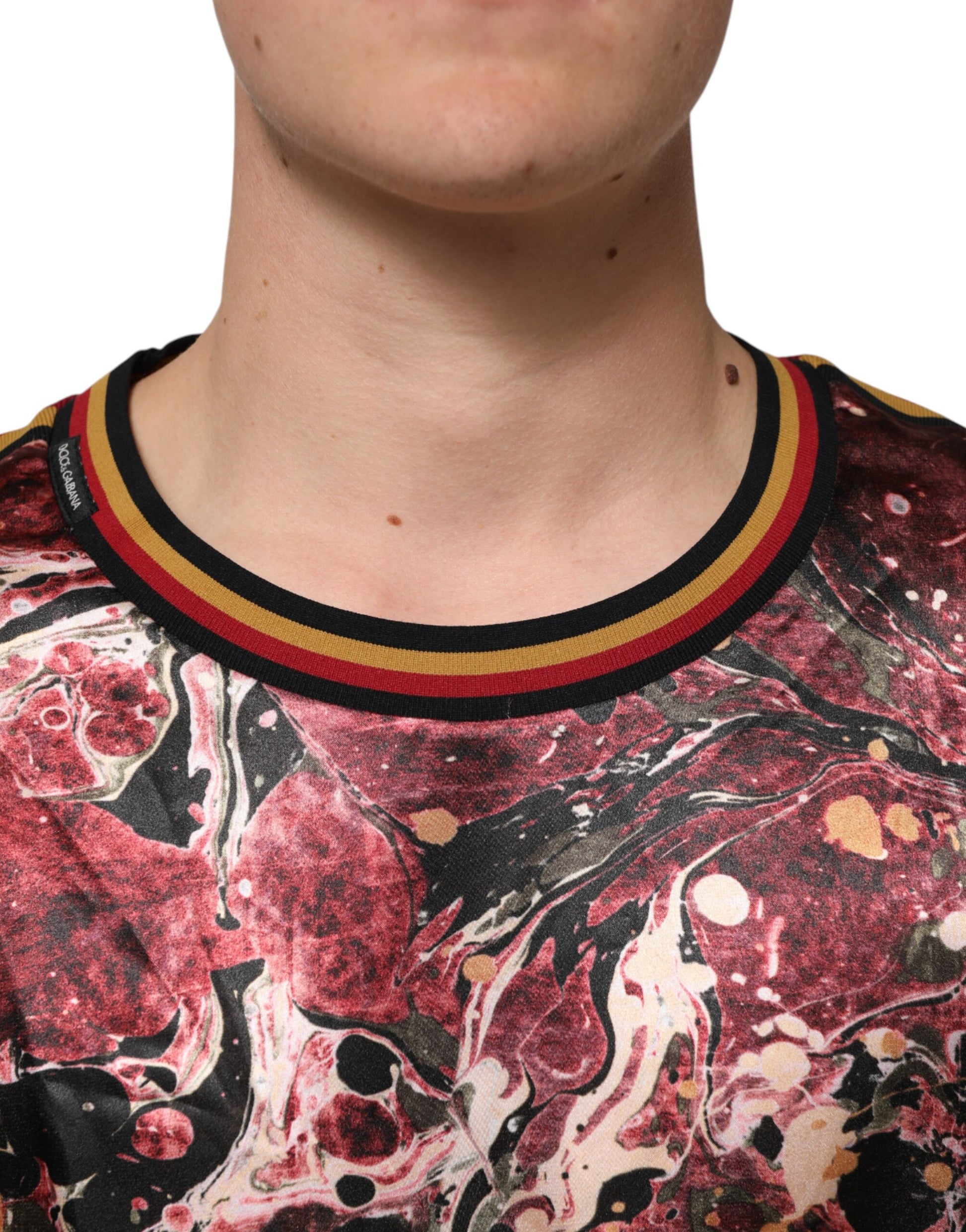 Man wearing a red and black patterned shirt