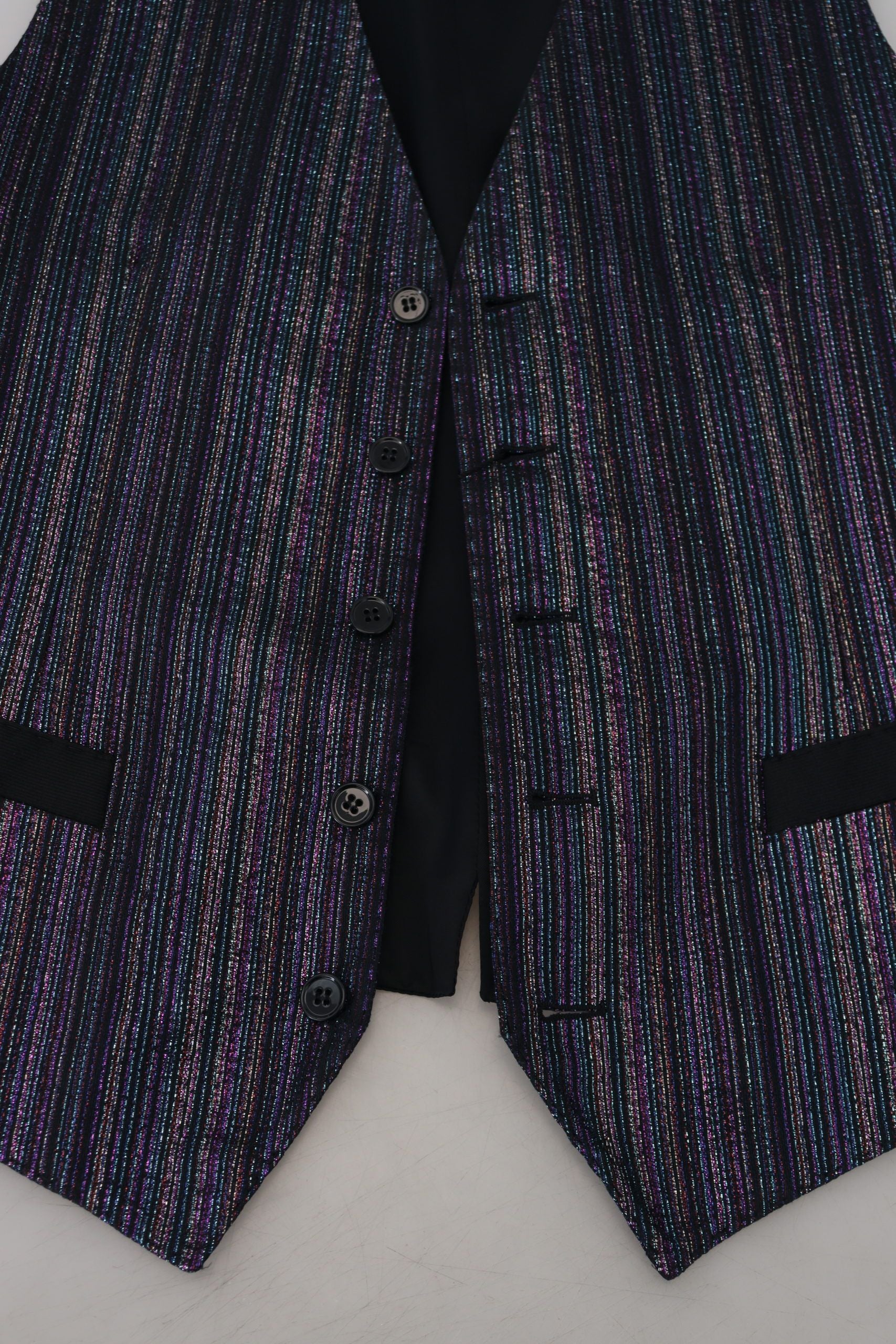 A vest with a multicolored pattern, featuring a polyester material