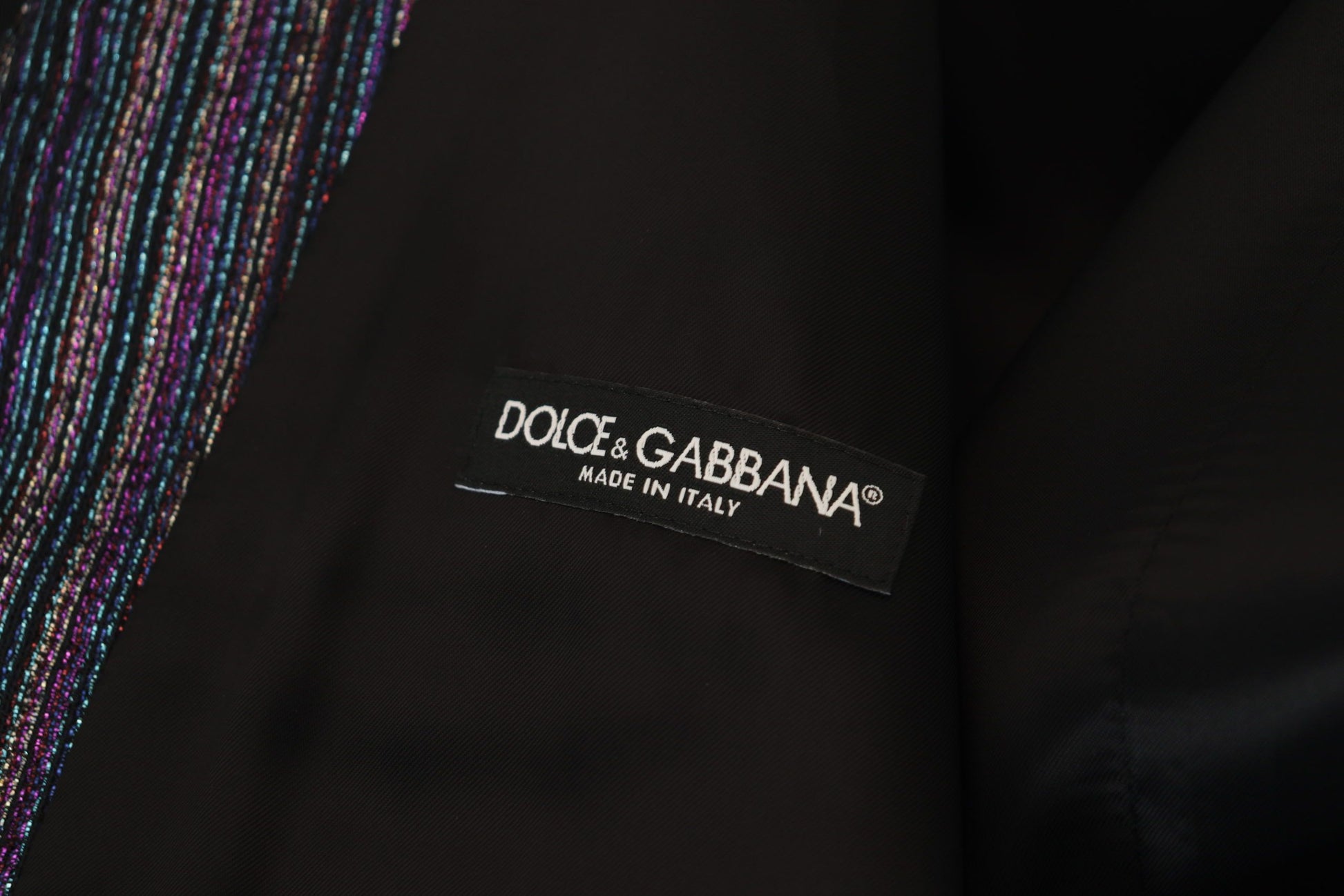 A black waistcoat with multicolored sequins