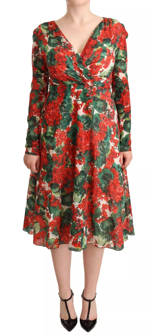 A long sleeve, knee length dress with a floral print and a V neckline