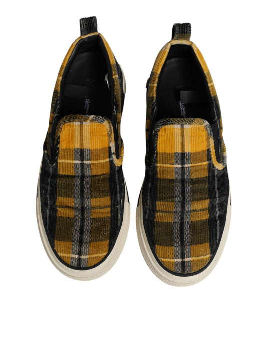 Pair of multicolored tartan check sneakers with laces and a rubber sole