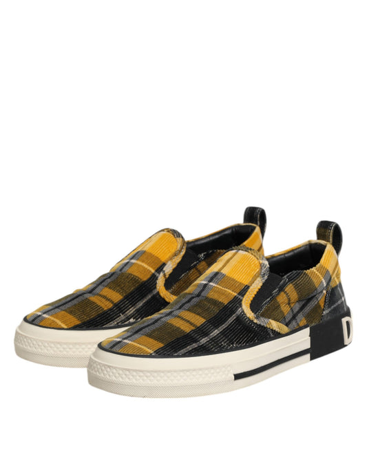 Yellow, black, and white slip-on shoes with a tartan check pattern