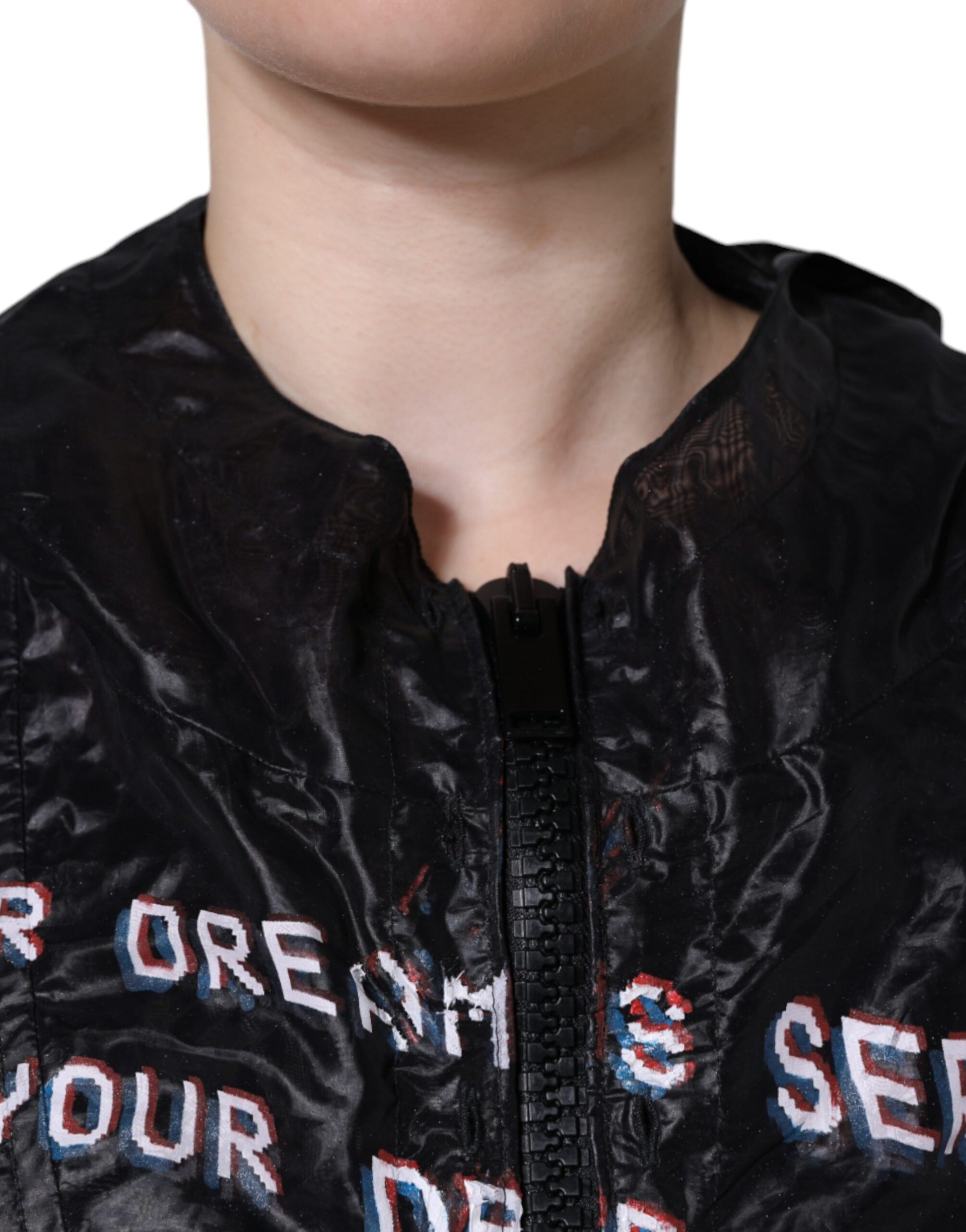 Black jacket with white lettering on front