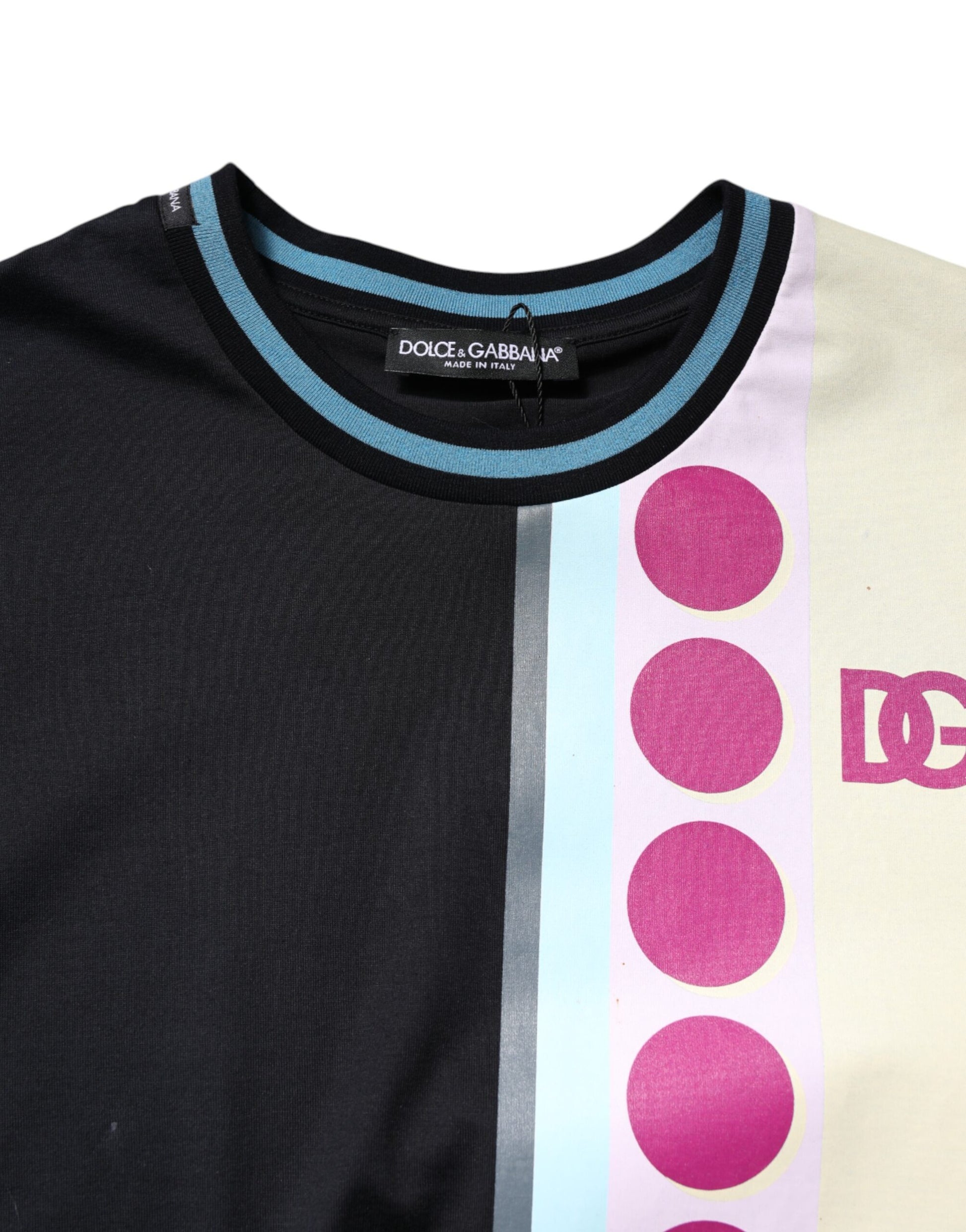 Black long sleeve shirt with blue collar and pink circles on front