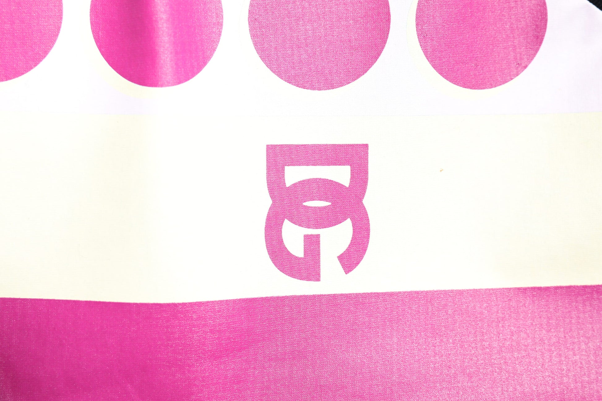 Pink and white fabric with a logo