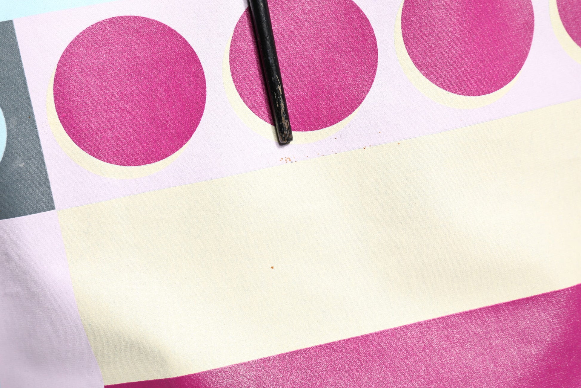 Pink and white fabric with circular patterns