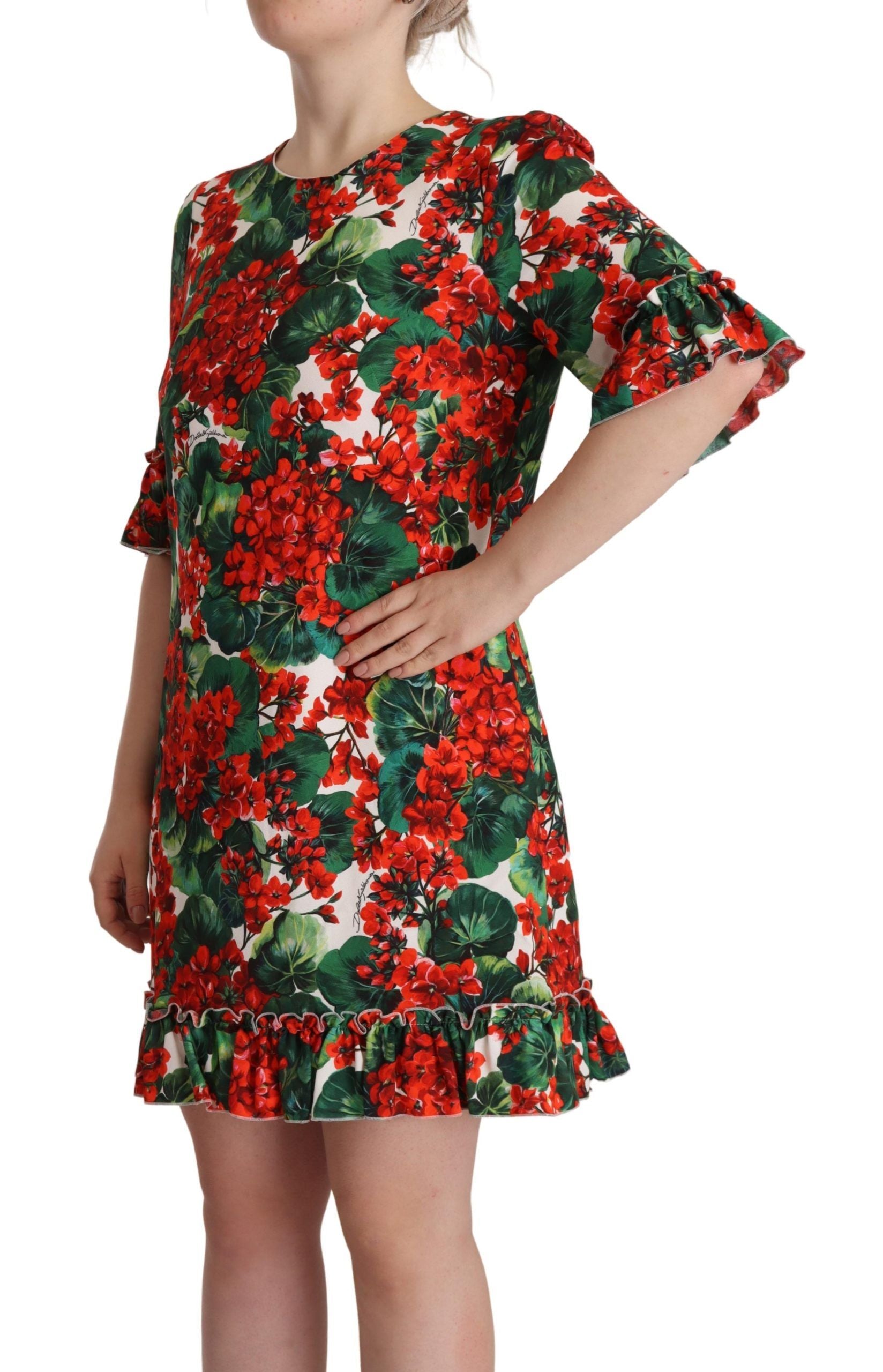 A woman's red floral shift dress with ruffled sleeves and a flared skirt