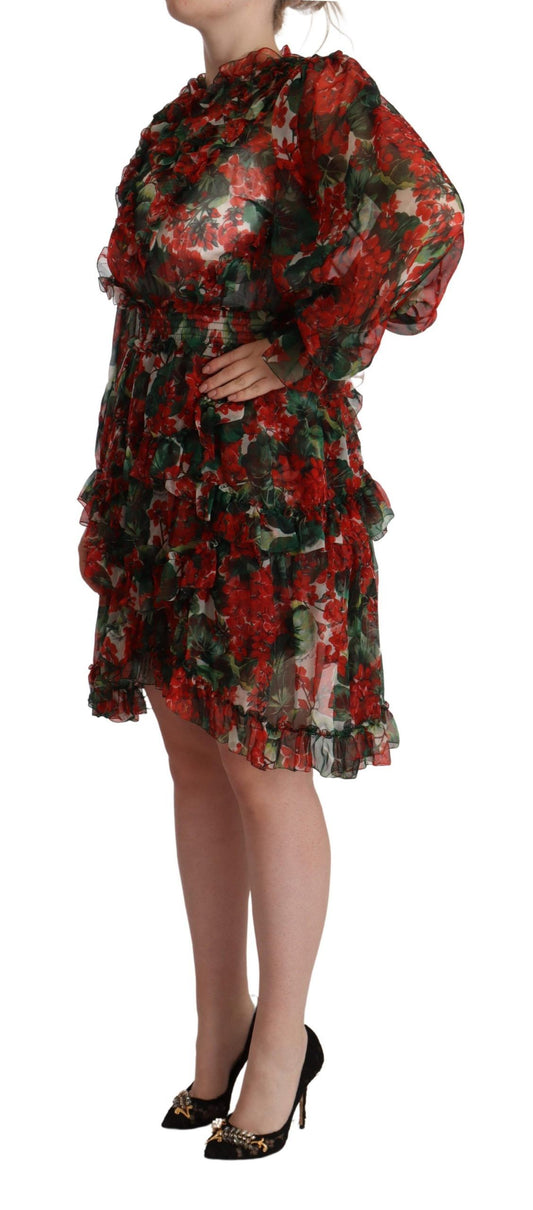 A long, red floral maxi dress with a silky texture and a fitted waist