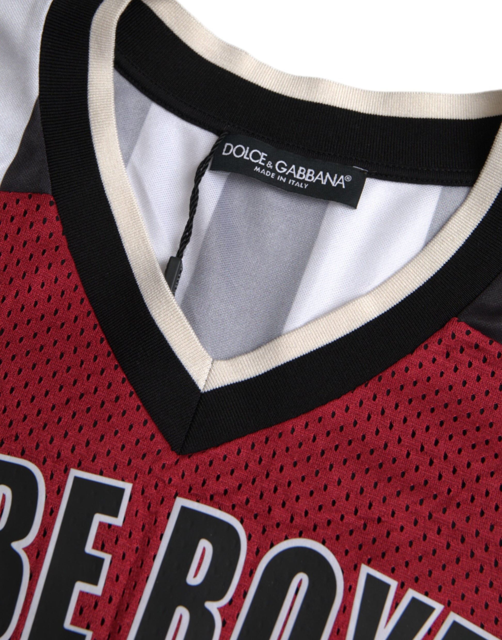 Red jersey with white lettering on front