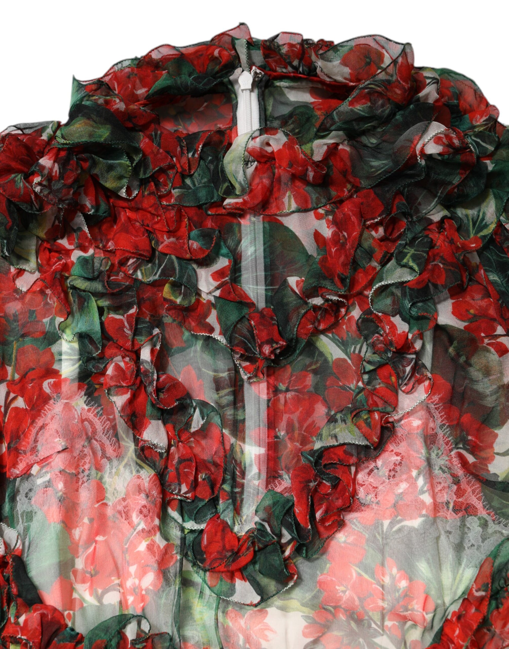 A long sleeve dress with a floral pattern and ruffled edges