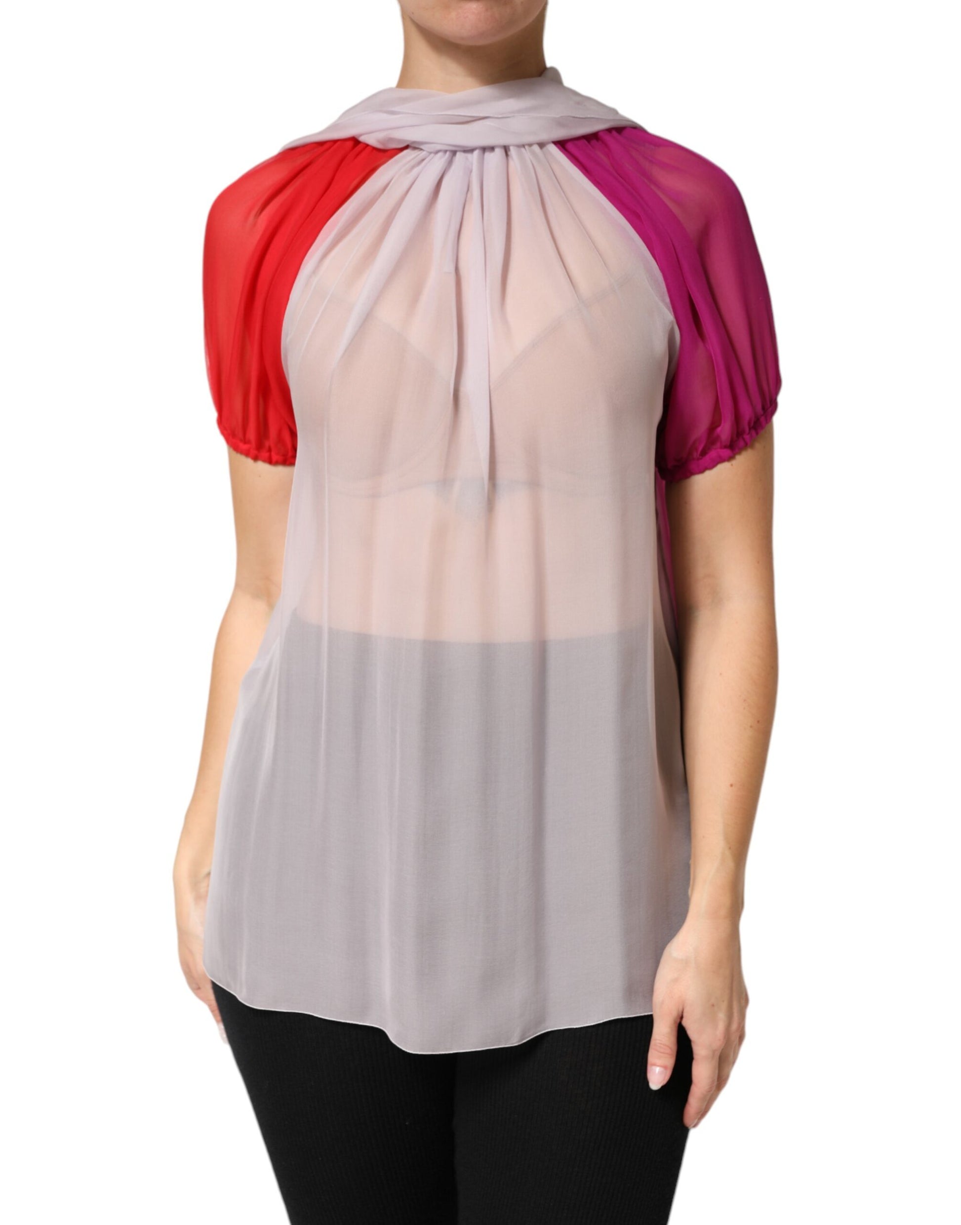 Woman wearing a sleeveless top with ruffled neckline