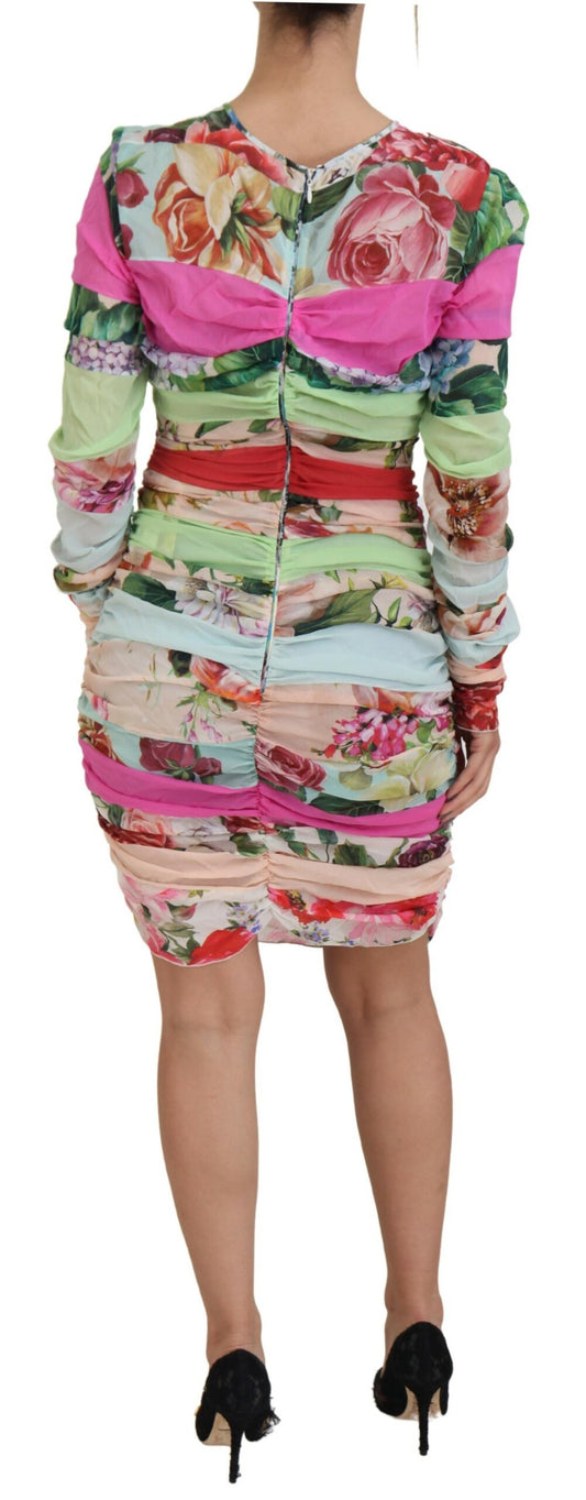 A colorful floral bodycon dress by Dolce & Gabbana, made of silk