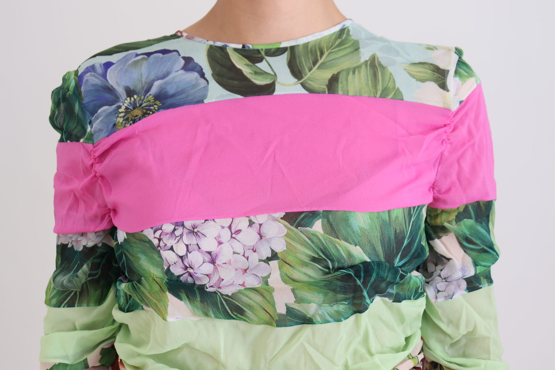 Pink, green, and white floral print dress with ruffled sleeves