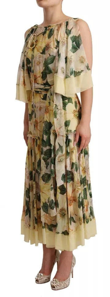 A long, flowing maxi dress with a floral print and ruffled sleeves