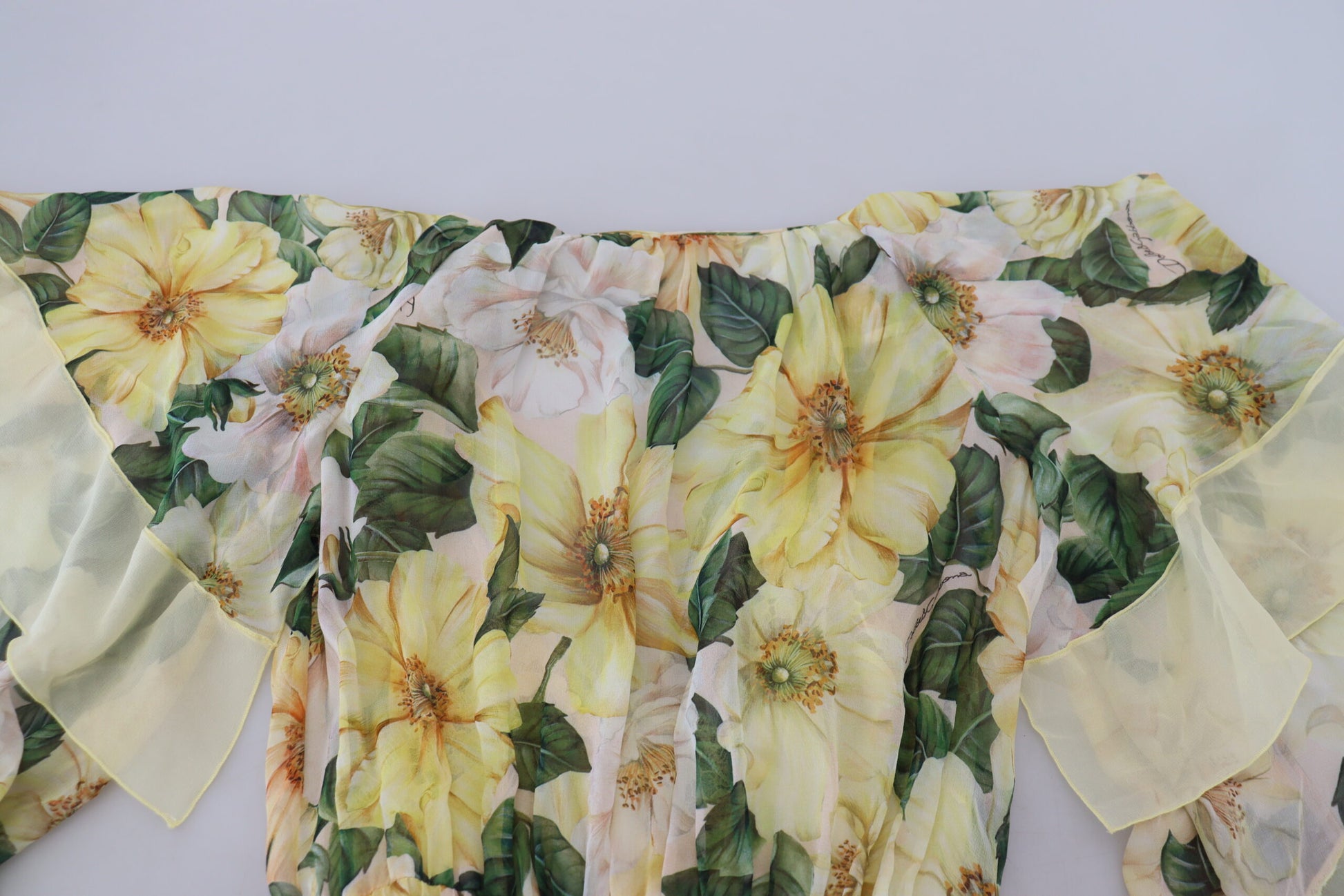 A long, multicolored silk dress with a floral print