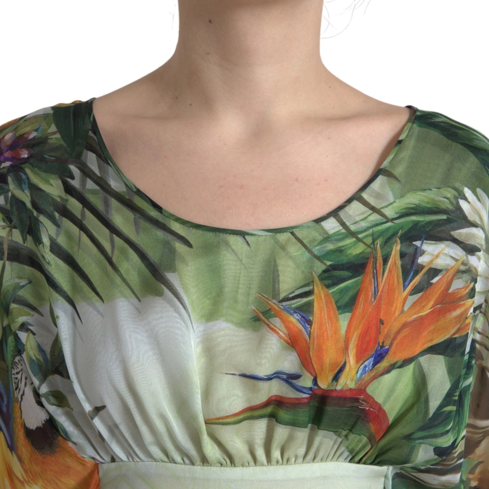 A woman's multicolored silk jungle print maxi dress with a floral design