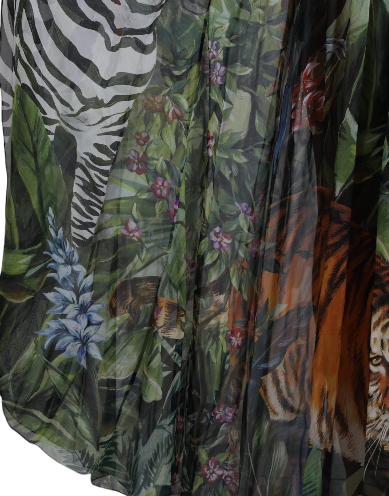 A colorful jungle print dress with tigers and zebras on a silky fabric