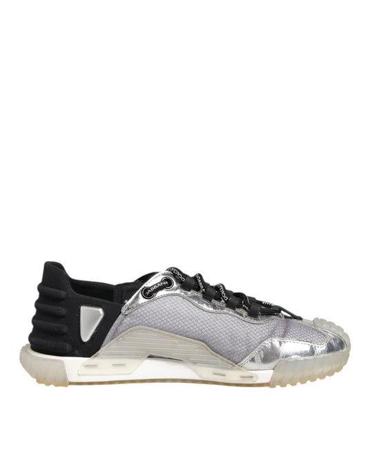 A pair of silver and black sneakers with a logo on the side