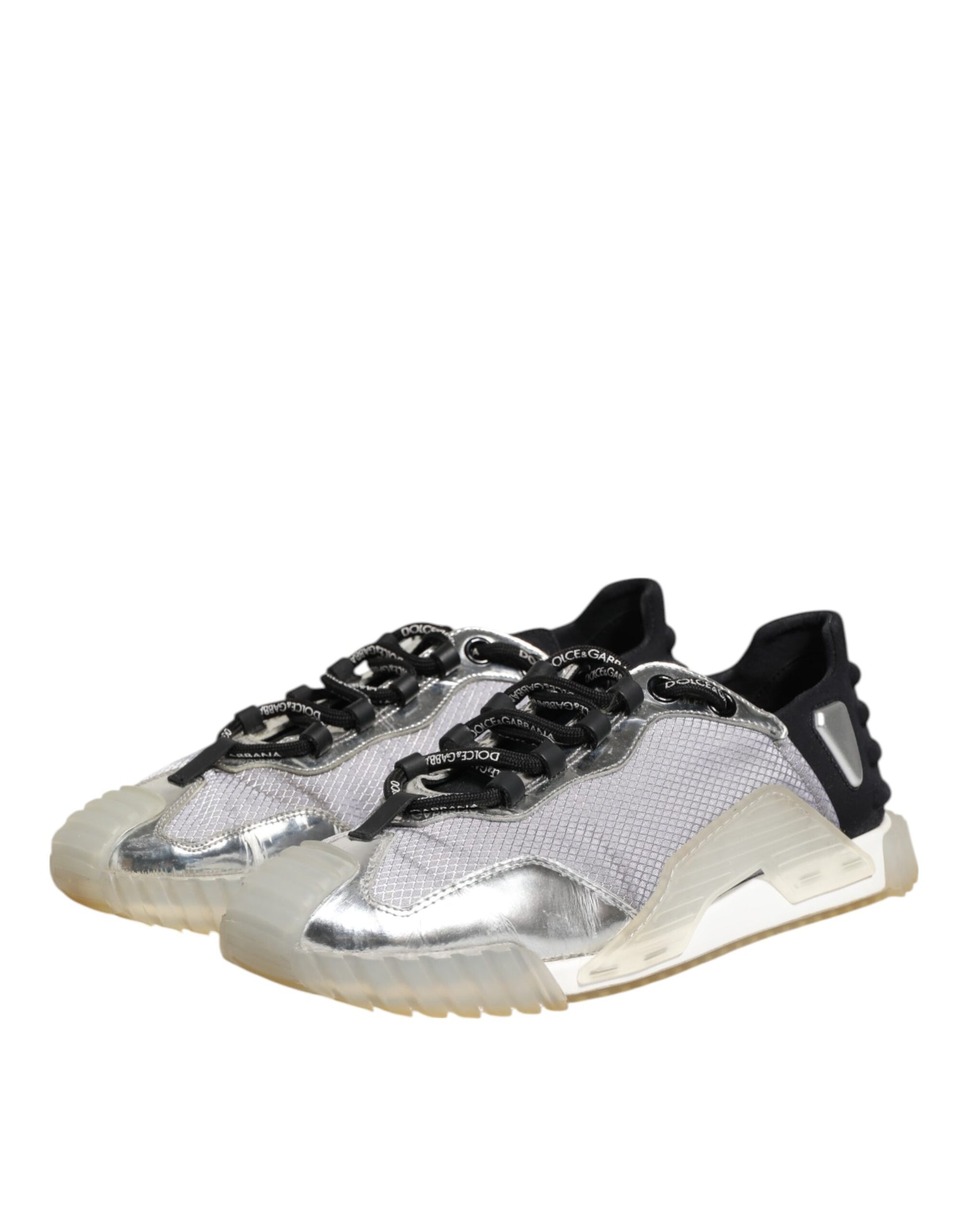 A pair of silver, multicolored sneakers with a logo on the side