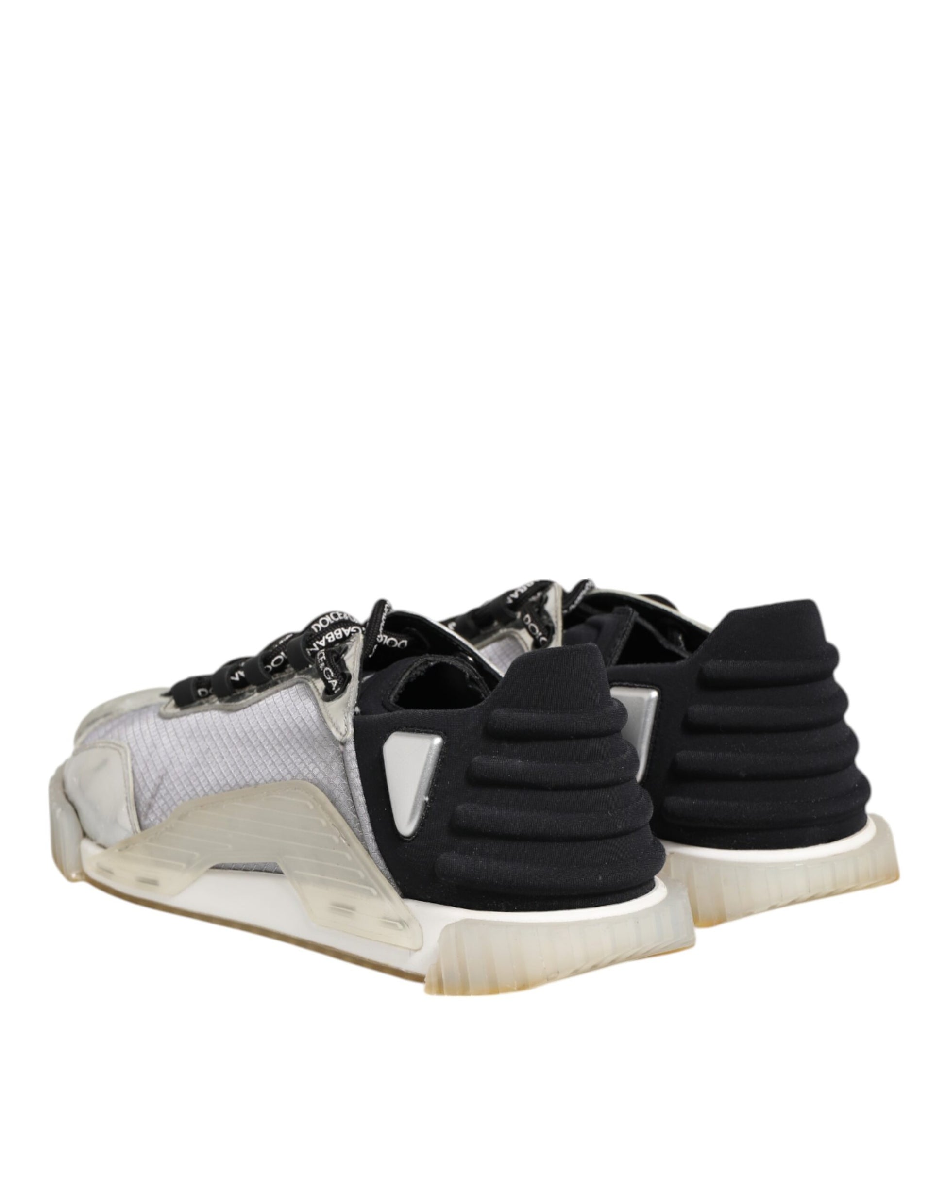 A pair of multicolored sneakers with a silver logo on the side