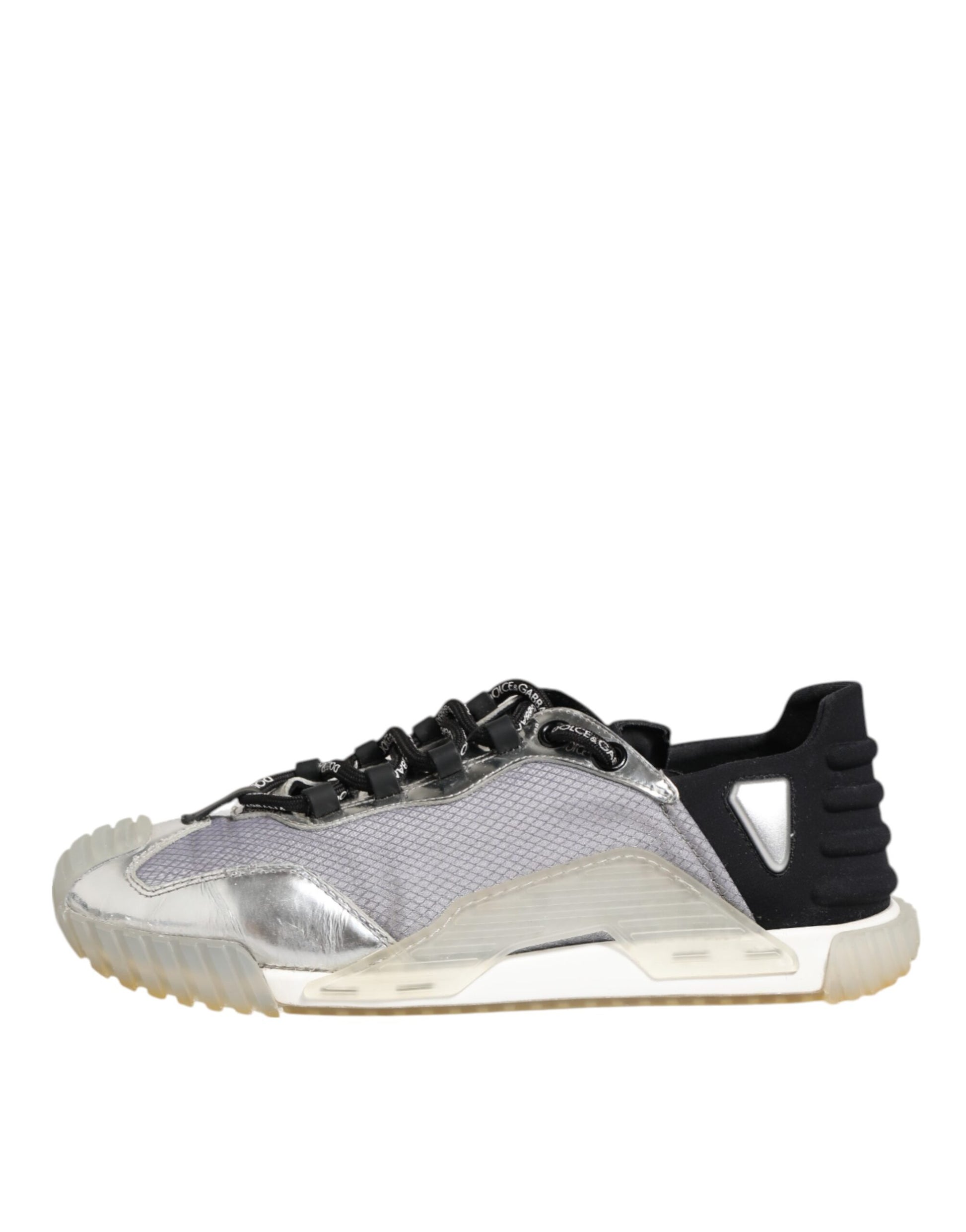 A pair of silver, black, and white sneakers with a logo on the side