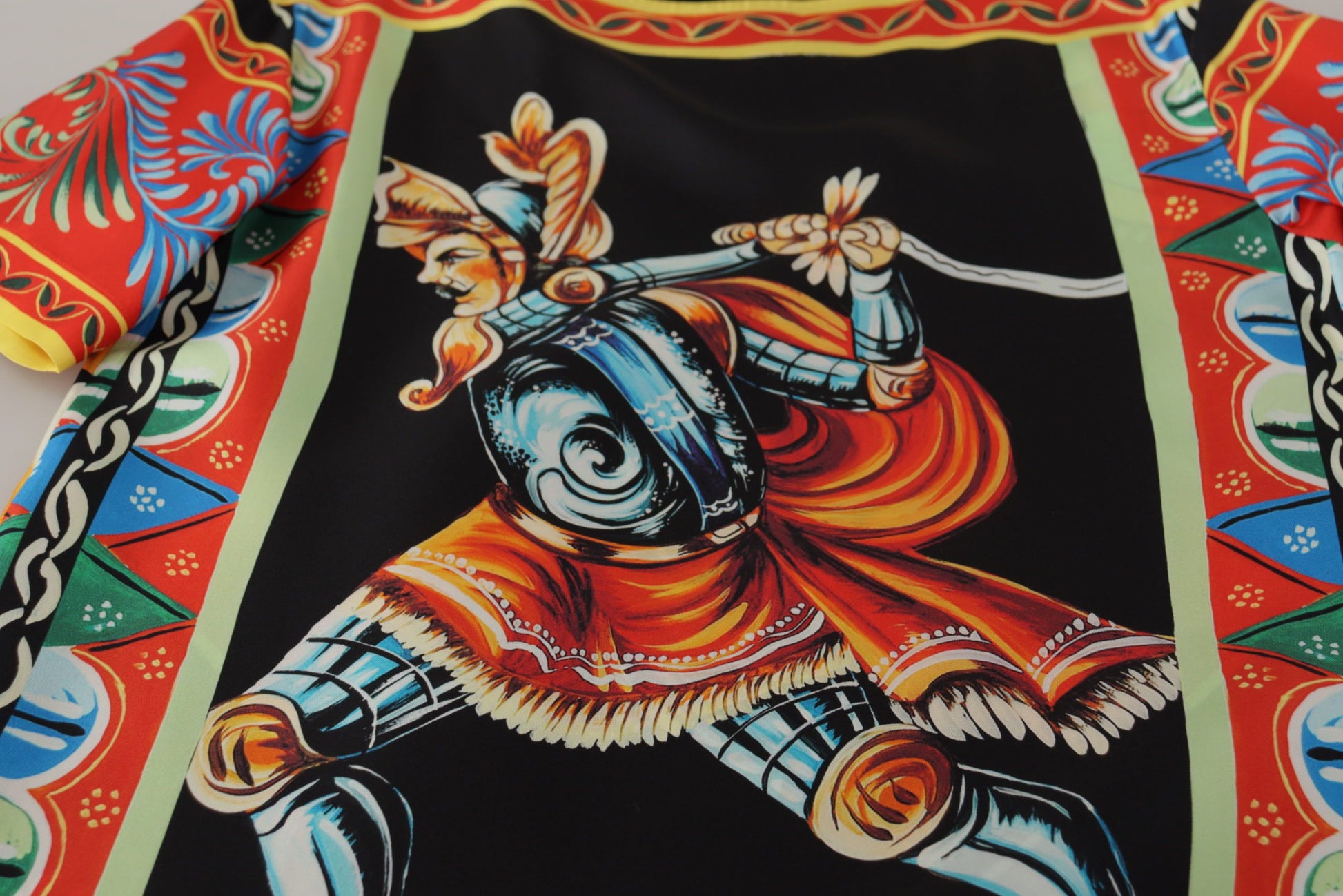Colorful embroidered knight's armor on fabric
