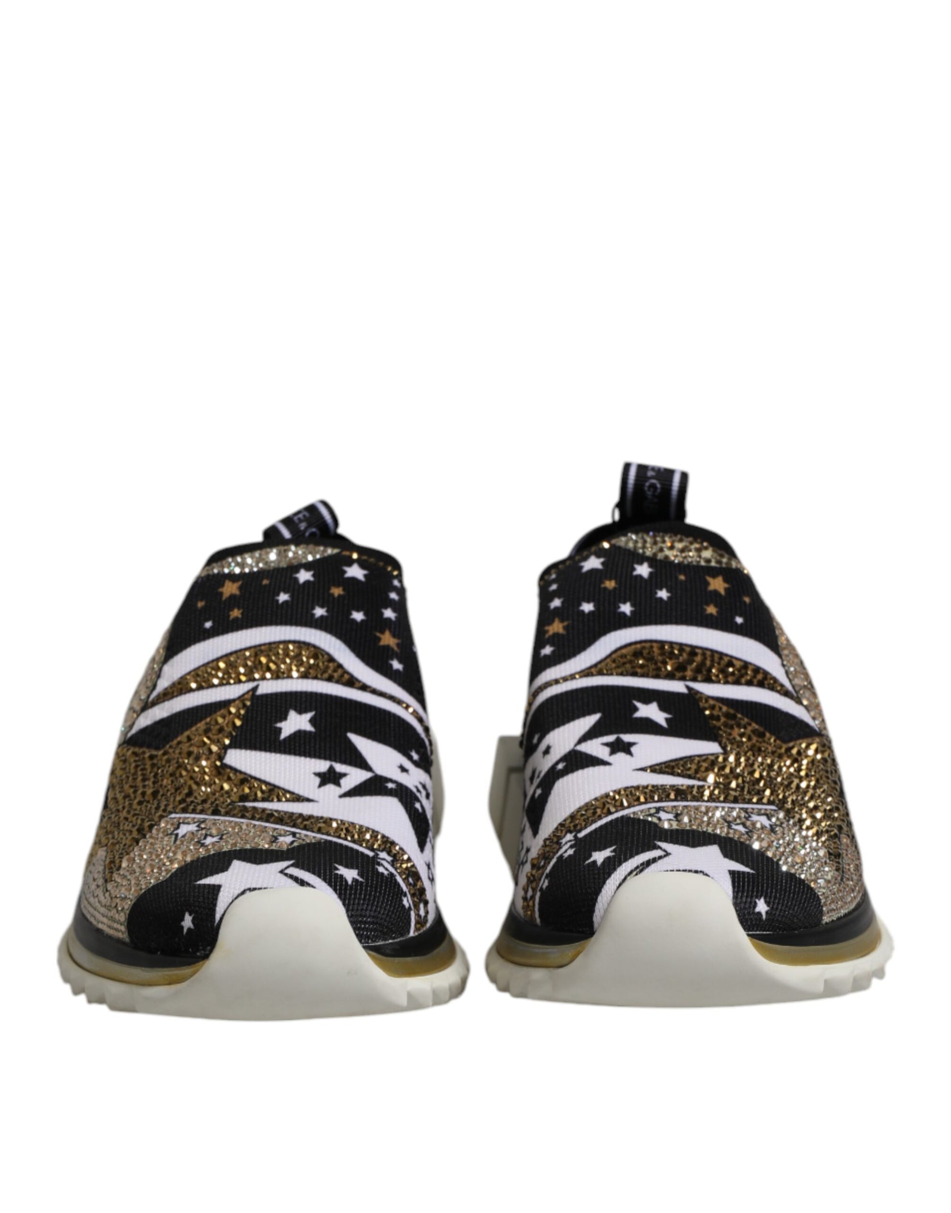 Pair of sneakers with star pattern on side