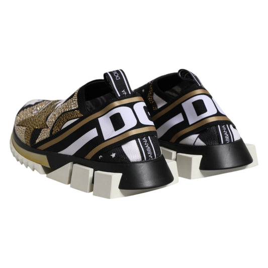 Pair of children's shoes with white soles and gold accents