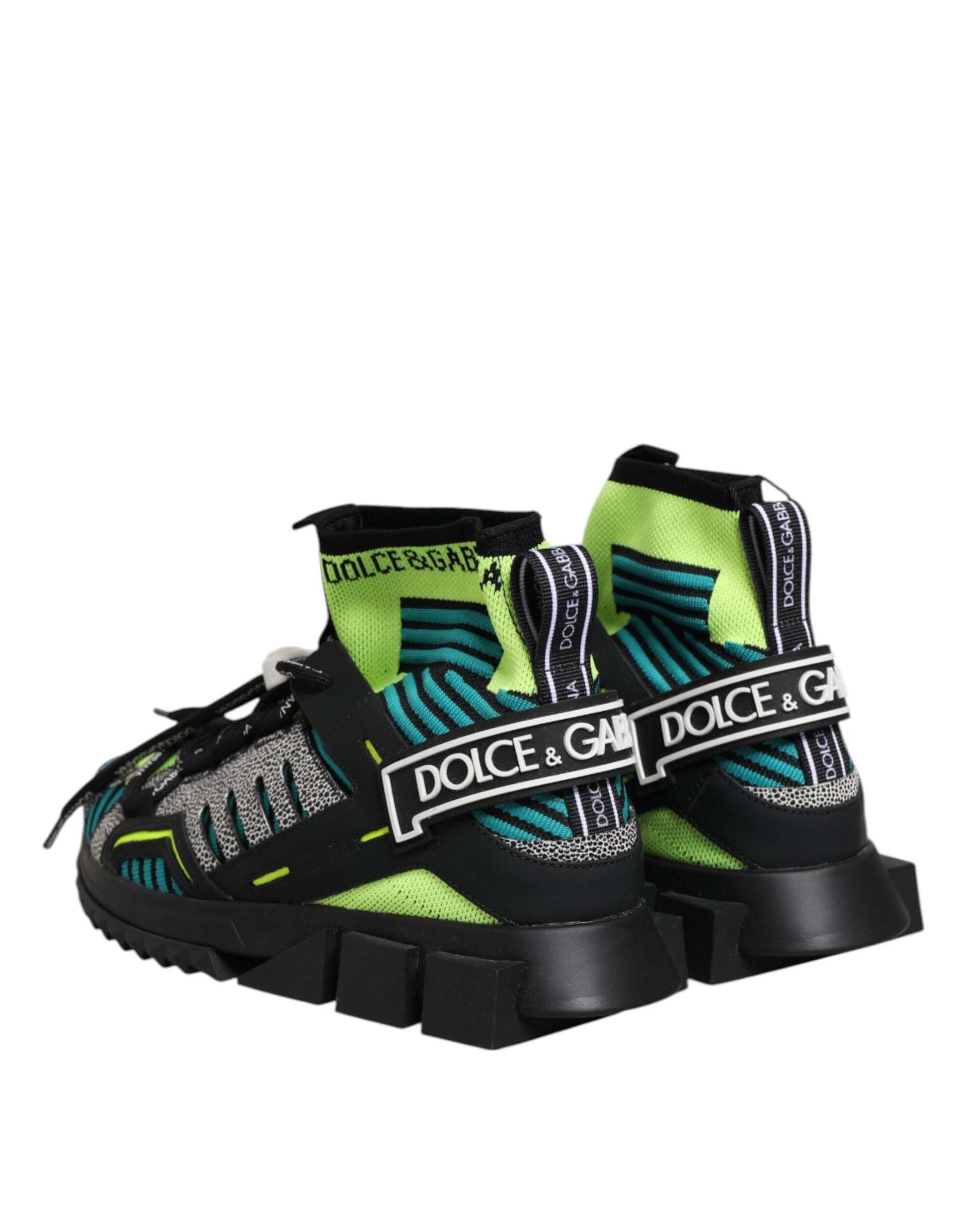 Pair of sneakers with green and blue accents