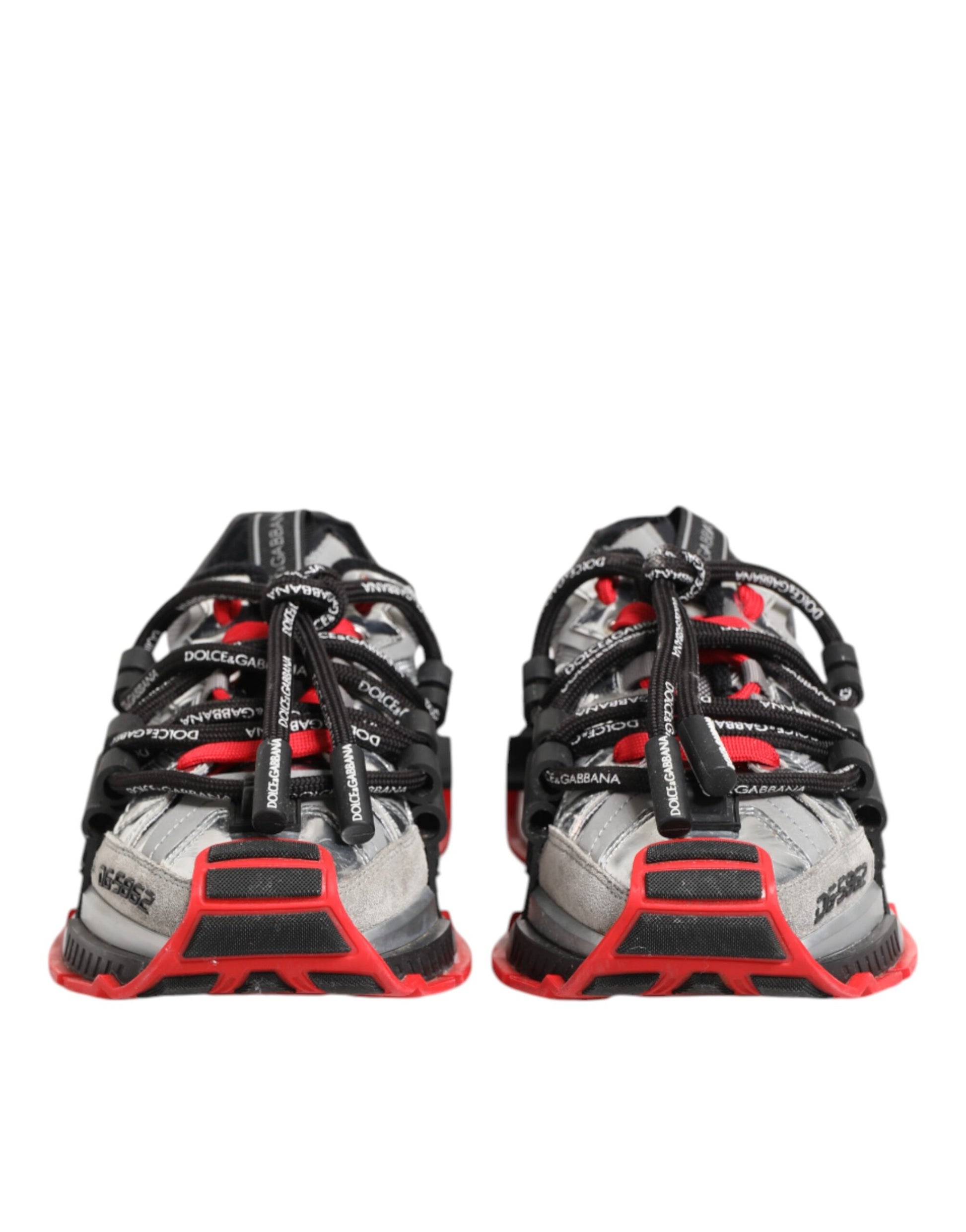 Pair of men's sneakers with red and black laces, white soles, and multicolored upper