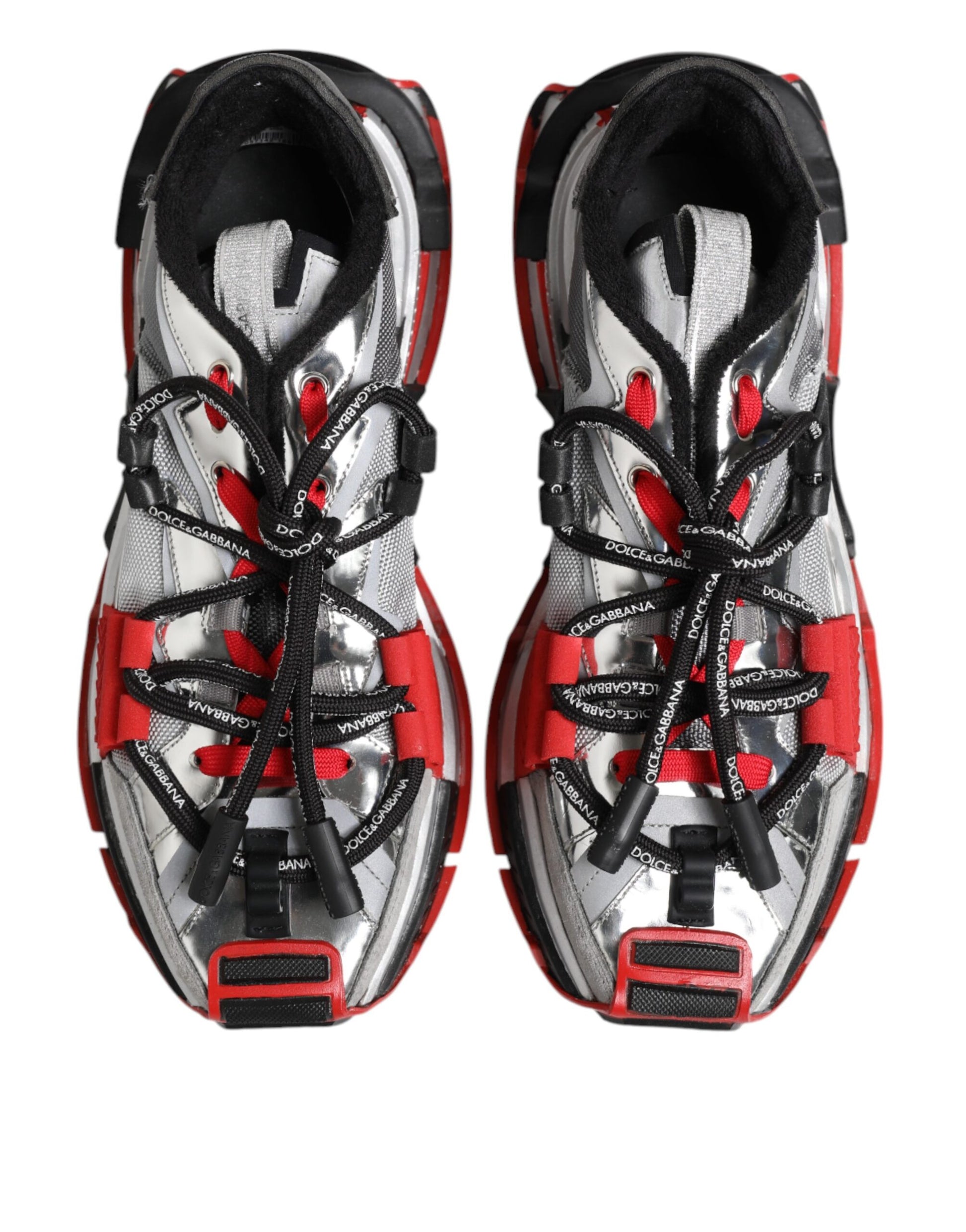 Pair of red and white athletic shoes