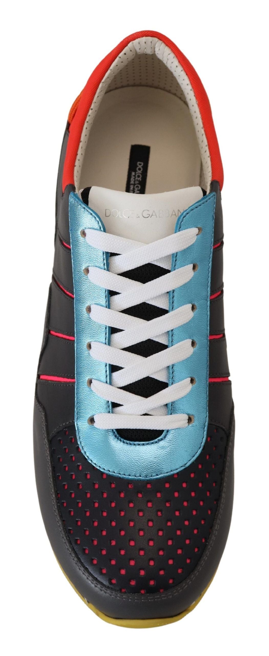 Black and red sneaker with blue laces and a white sole