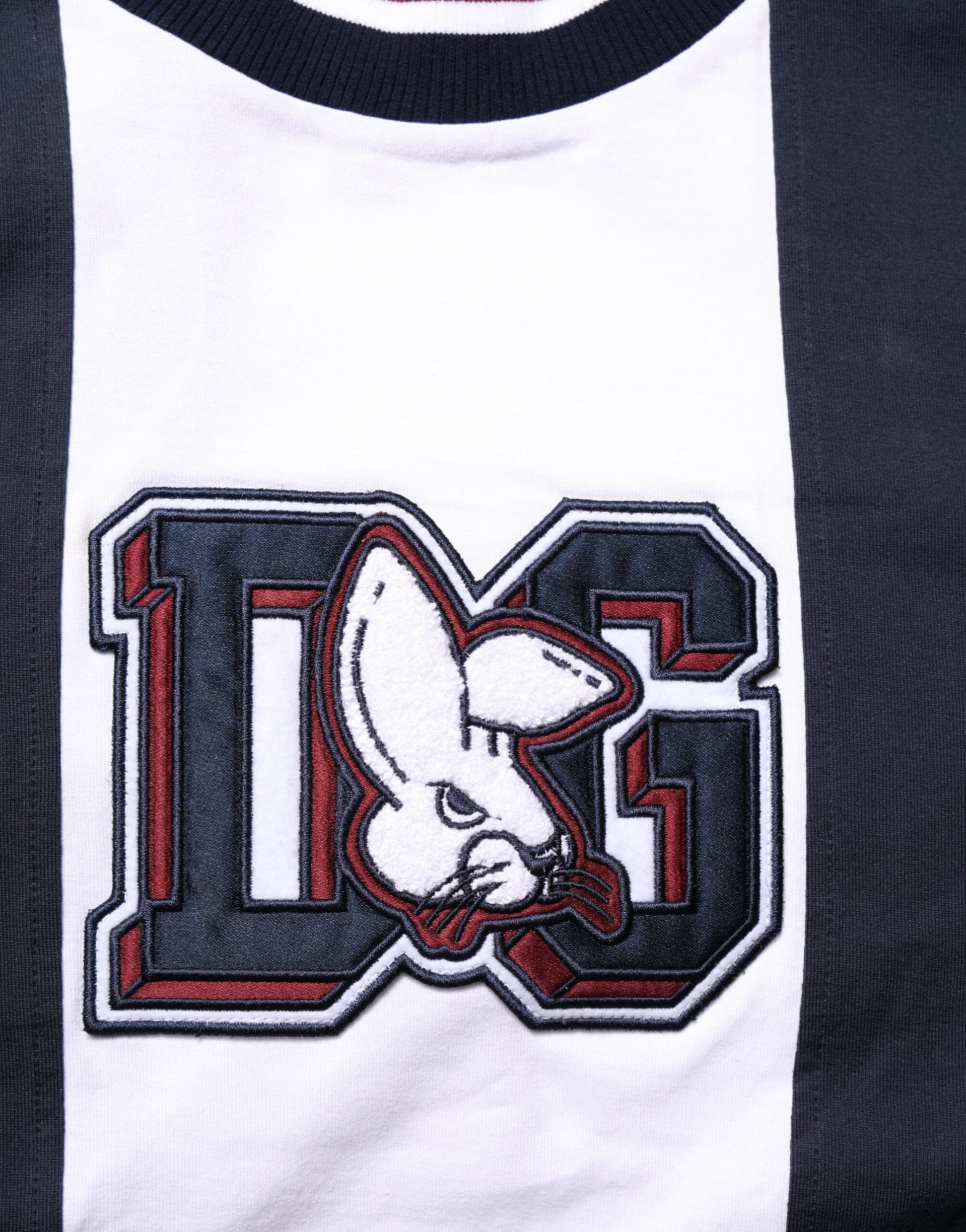 Black and white striped shirt with embroidered logo