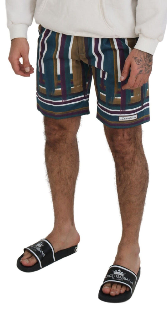 Man wearing colorful shorts and flip flops