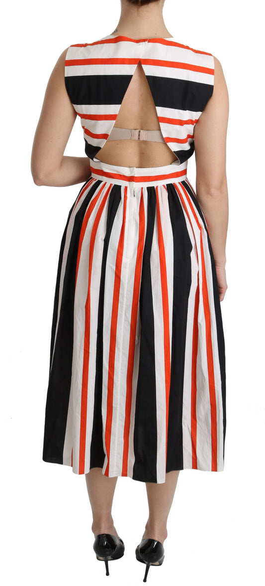 A midi dress with a colorful striped pattern featuring red, white, and black stripes. It has an asymmetrical