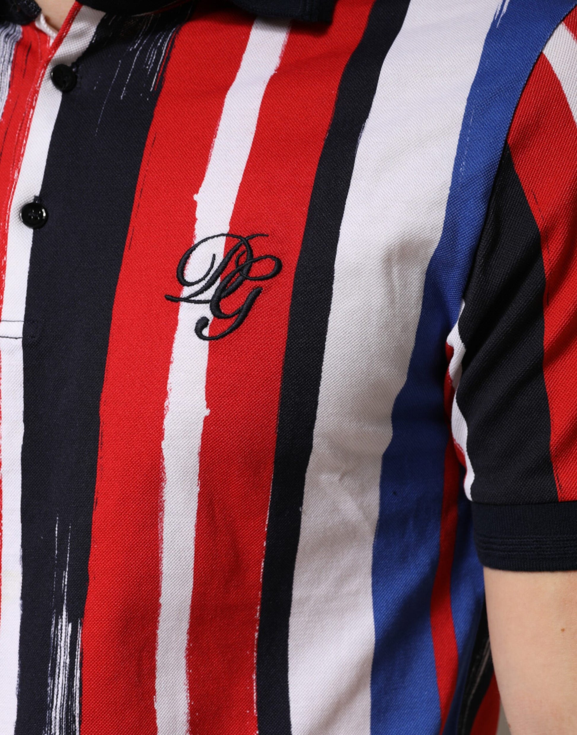 Red white and blue striped polo shirt with embroidered logo on left chest