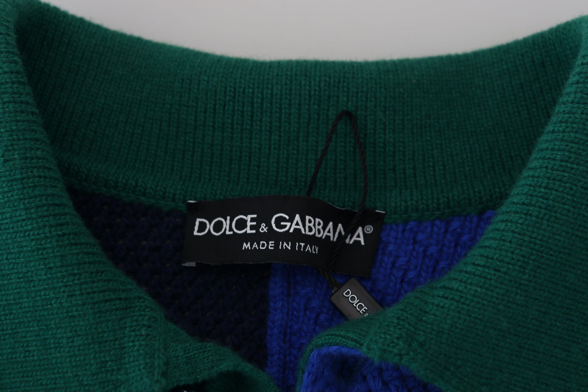 Green sweater on hanger