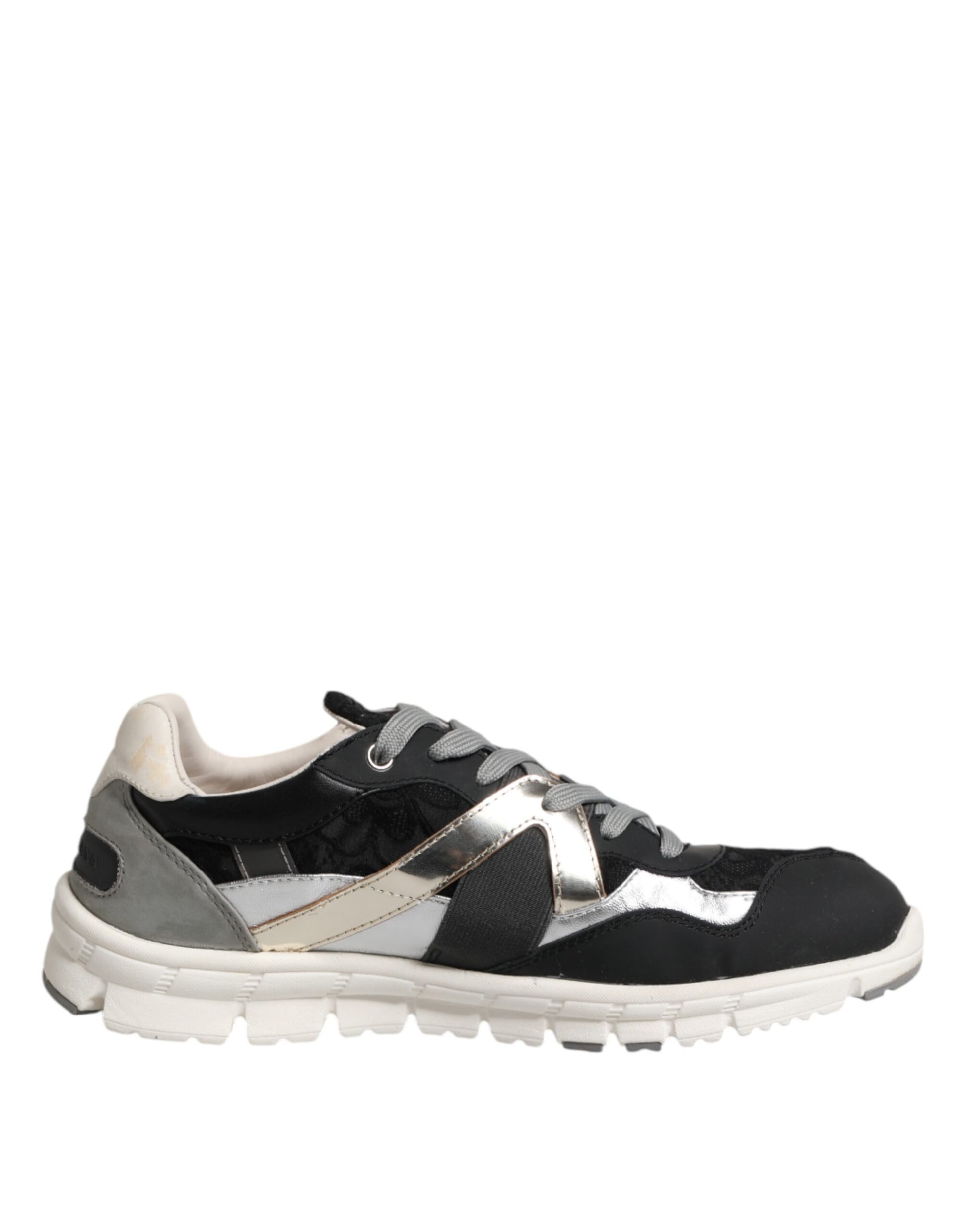 Black and white sneakers with gold accents, featuring a low top design for men