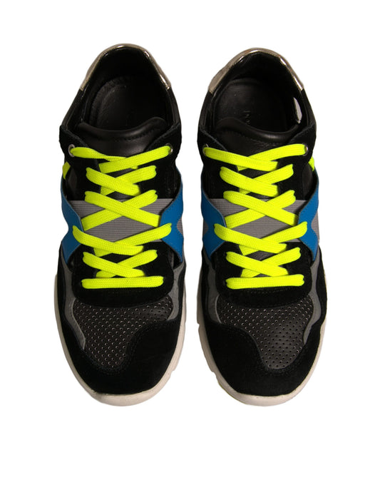 Pair of black and yellow sneakers