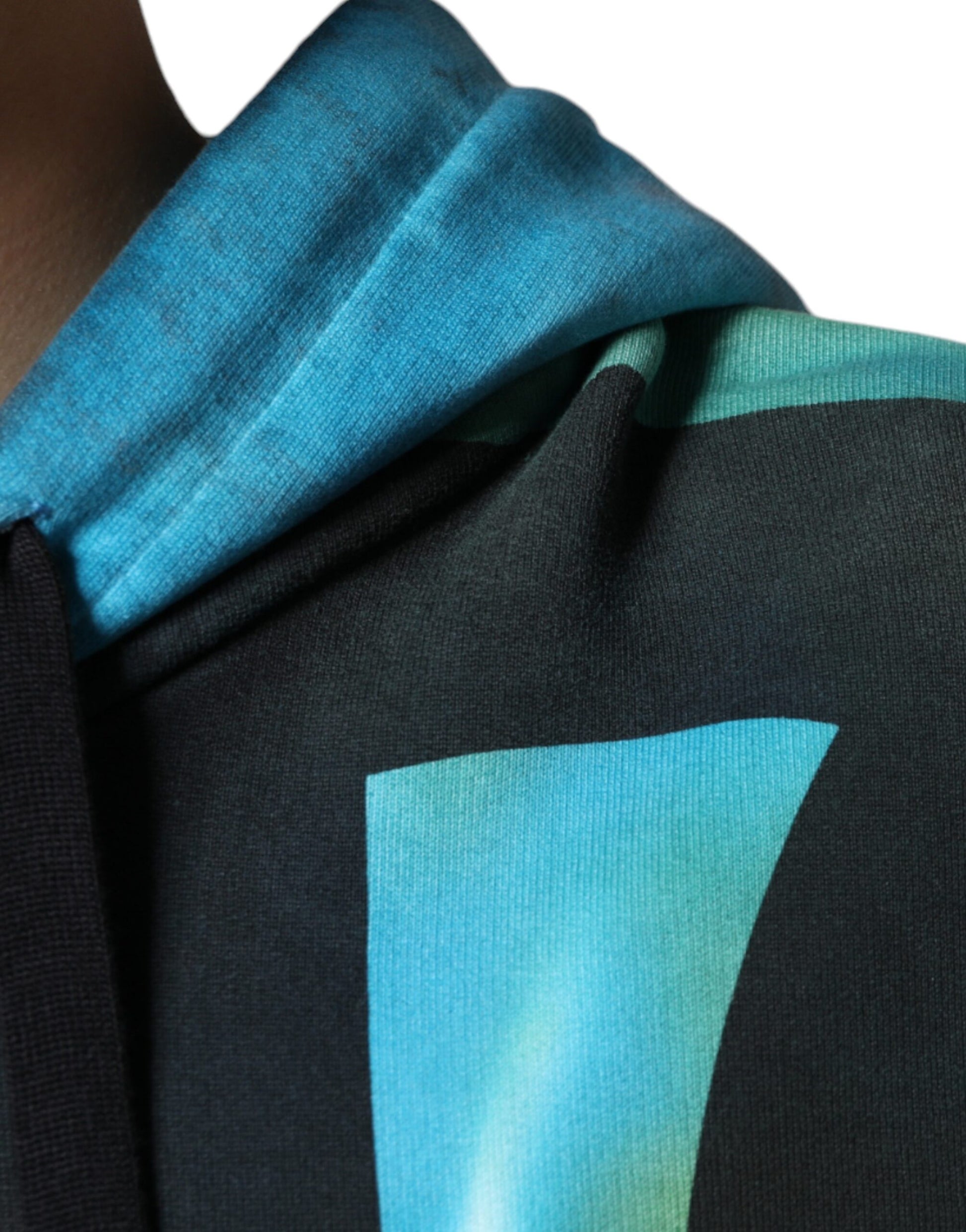 Blue hoodie with black sleeves and a graphic design on the front