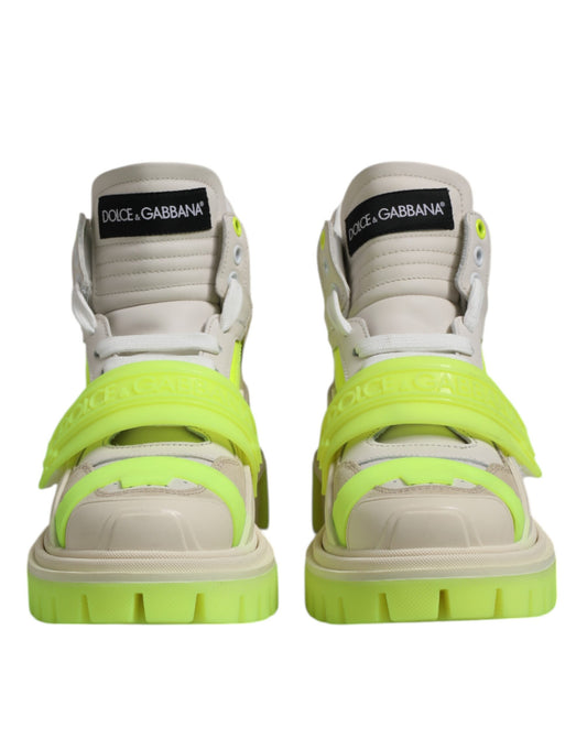 Pair of sneakers with yellow laces