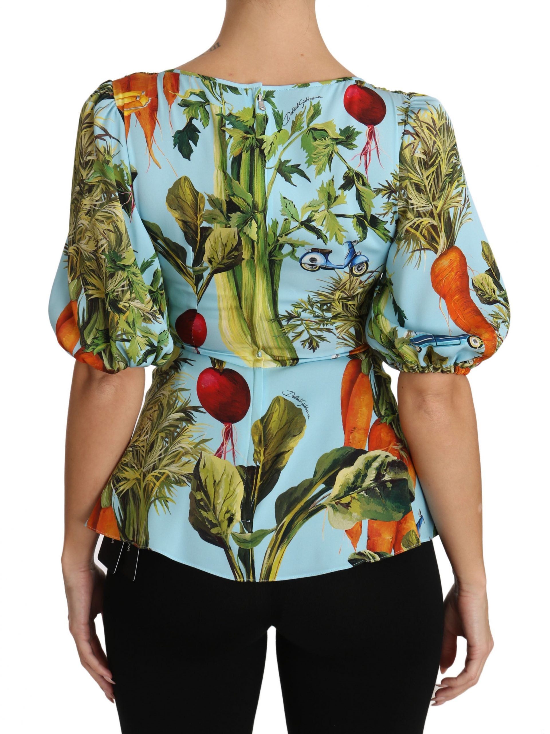 Blue blouse with floral pattern on back