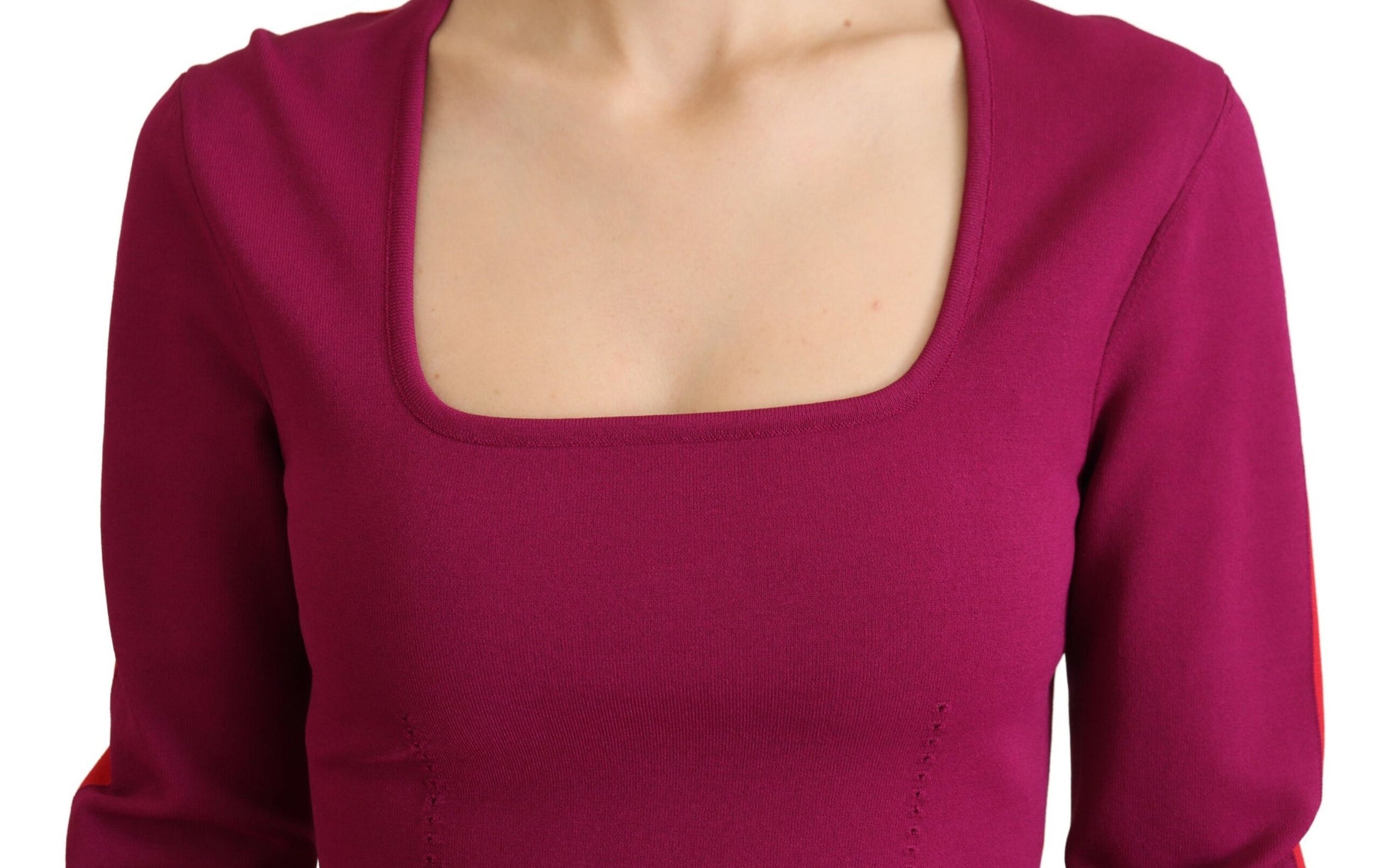 Red long sleeve sweater on a mannequin