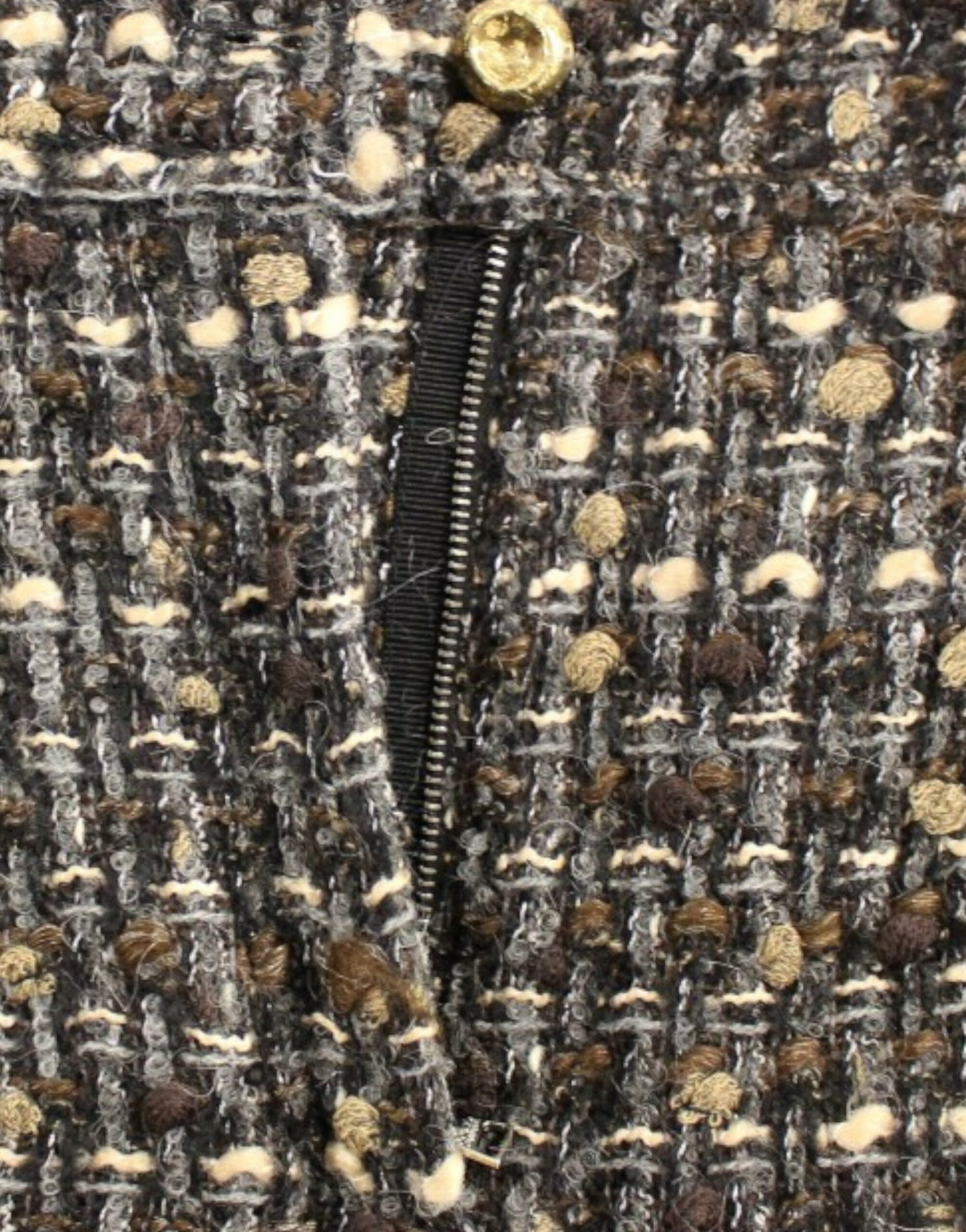 The jacket has a zipper on the front