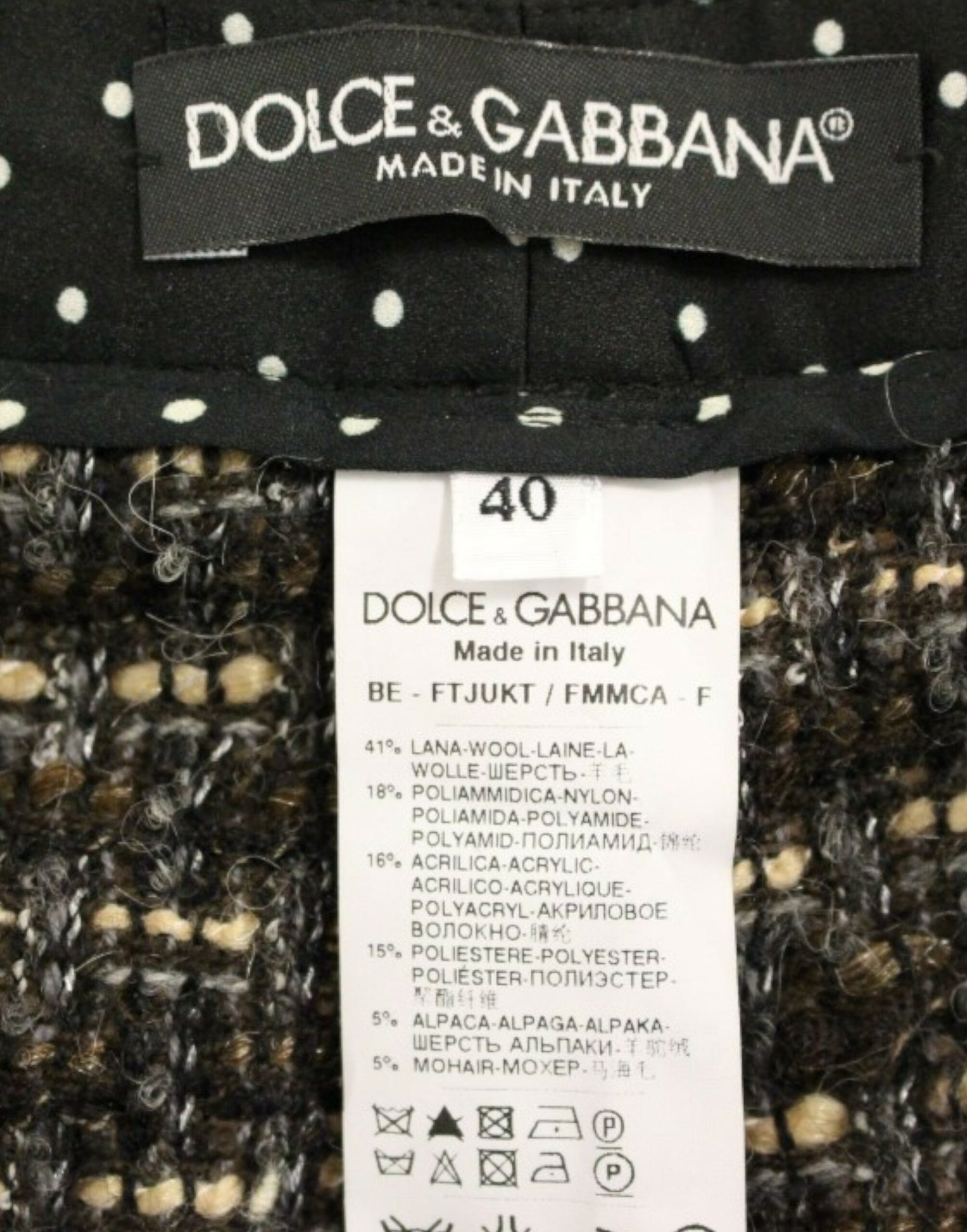 Black label on fabric with white polka dots