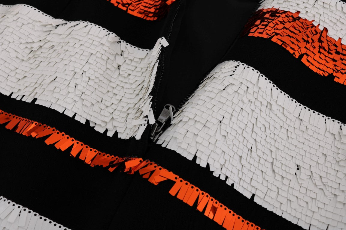 Colorful quilted fabric with red, white, and black colors
