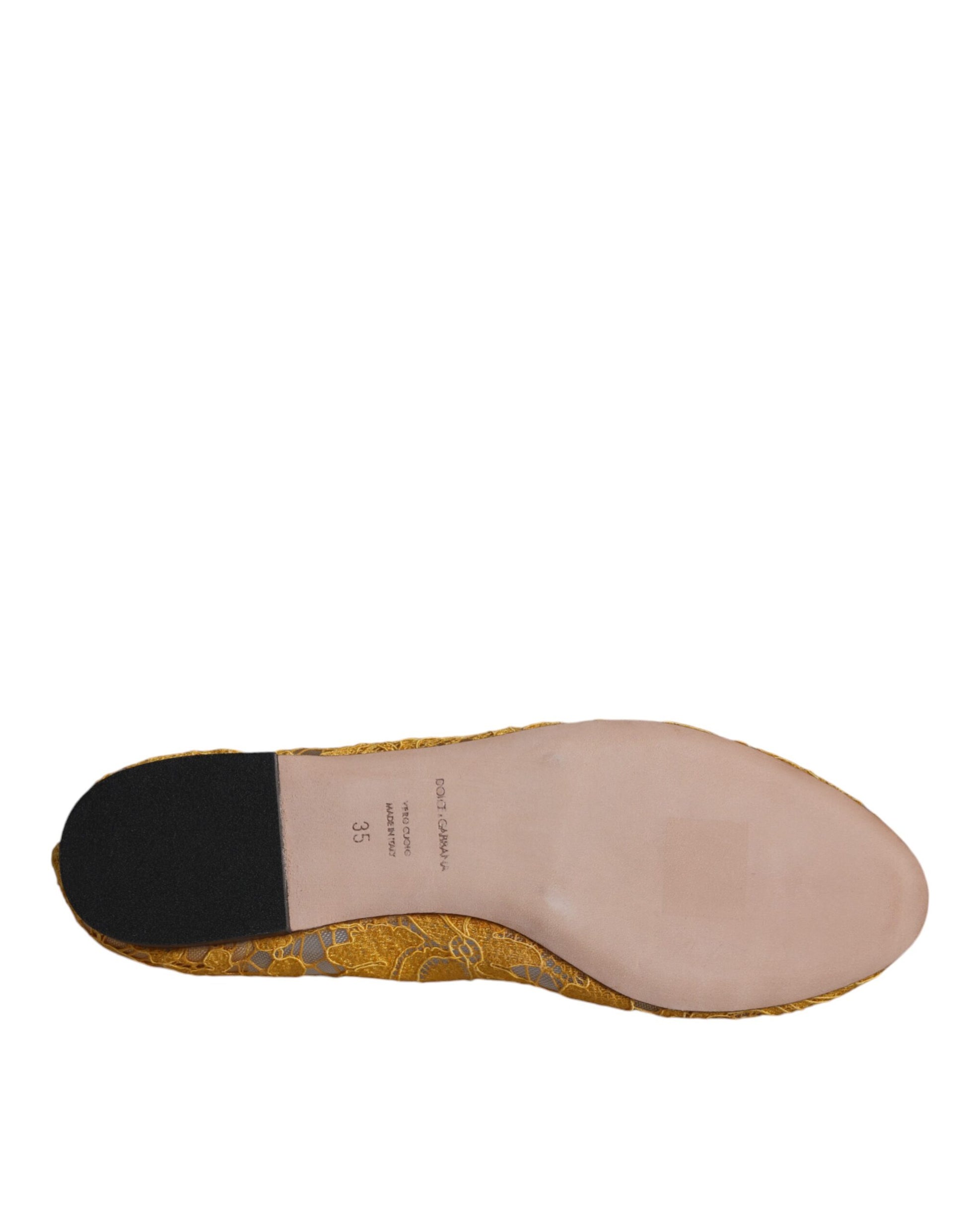 Pink shoe with gold glitter on sole