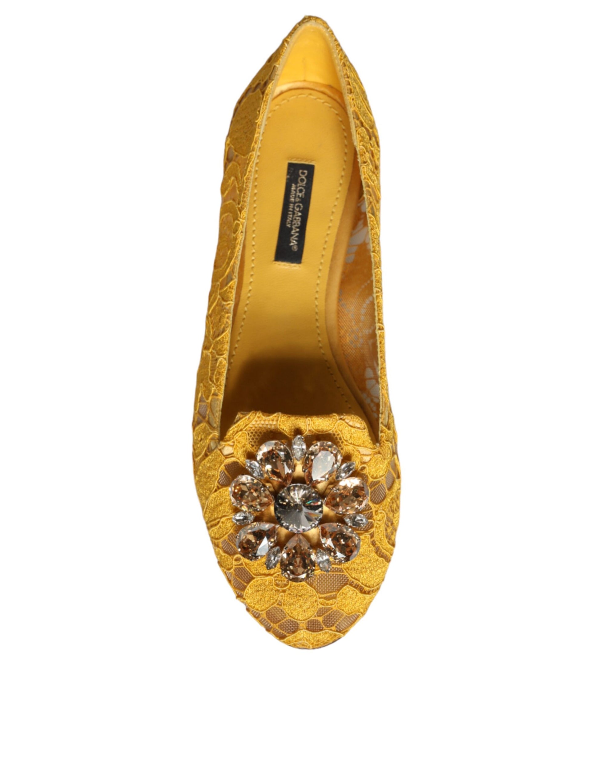 Yellow shoe with embellishments on toe