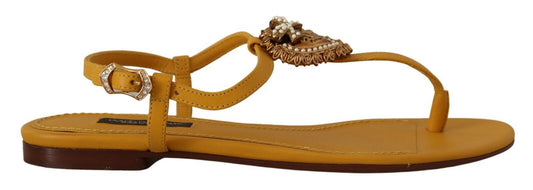 Yellow women's sandals with embellishments and straps