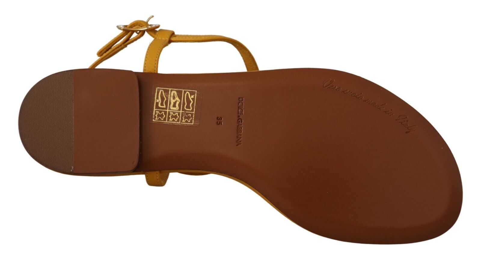 Brown hiking boot with yellow strap and buckle